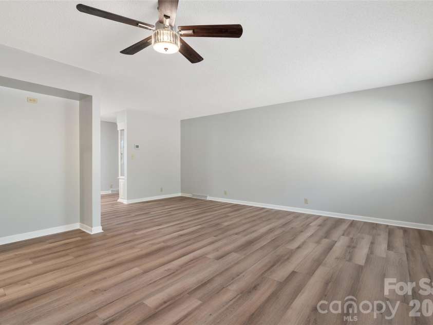 177 Country Road, Brevard, NC 28712.  MLS# CAR4331817, YatesRealty ID 12832. Large living room
