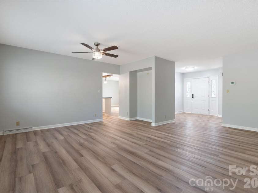 177 Country Road, Brevard, NC 28712.  MLS# CAR4331817, YatesRealty ID 12832. Large living room into Entry