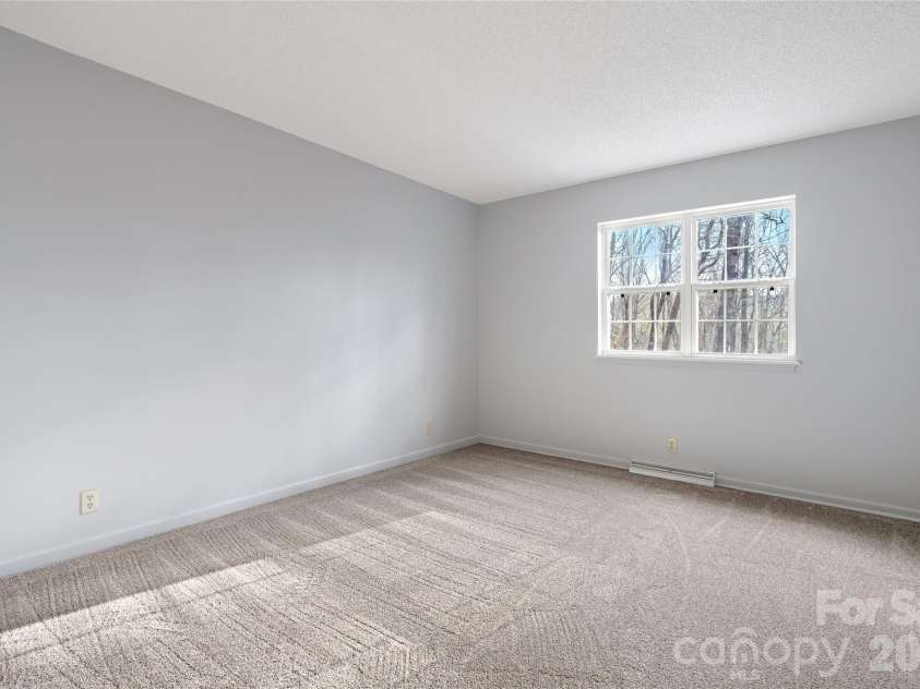177 Country Road, Brevard, NC 28712.  MLS# CAR4331817, YatesRealty ID 12832. Main level bedroom 1