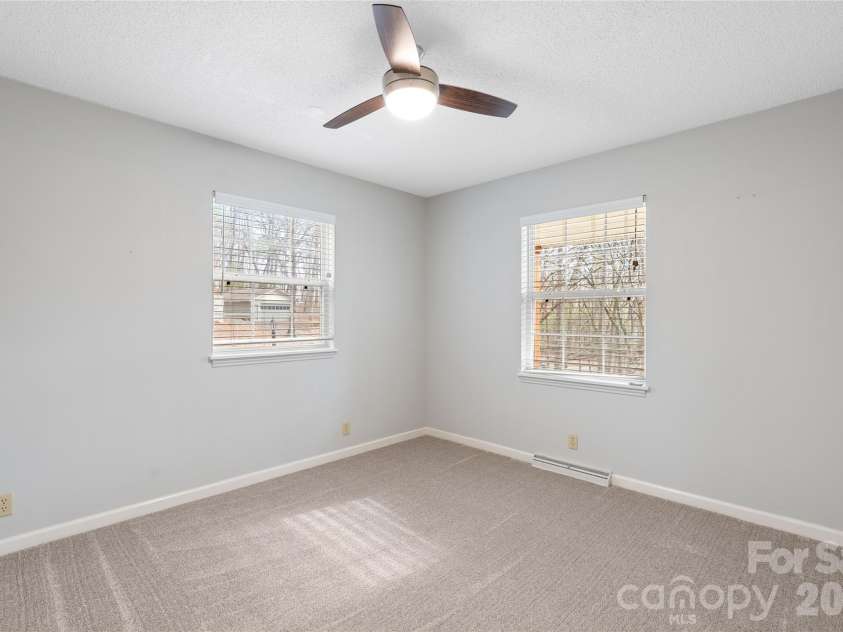 177 Country Road, Brevard, NC 28712.  MLS# CAR4331817, YatesRealty ID 12832. Main level Bonus room