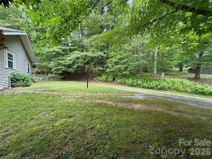 177 Country Road, Brevard, NC 28712.  MLS# CAR4331817, YatesRealty ID 12832. Plenty of main level parking