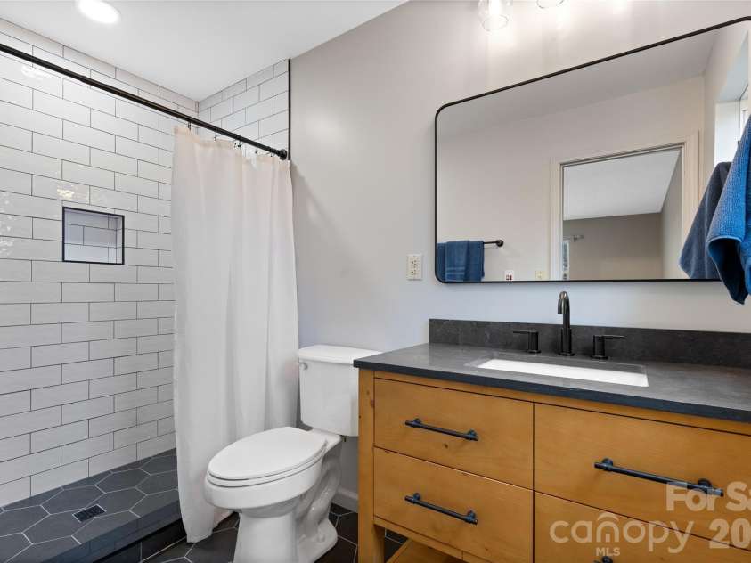 177 Country Road, Brevard, NC 28712.  MLS# CAR4331817, YatesRealty ID 12832. Primary bathroom