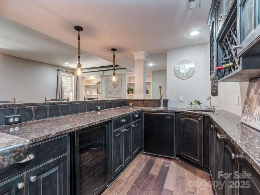 2301 Keara Way, Charlotte, NC 28270.  MLS# CAR4256879, YatesRealty ID 12833. Entertaining Bar