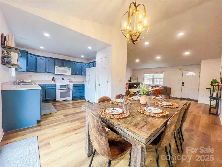 805 Reems Creek Road, Weaverville, NC 28787.  MLS# CAR4206802, YatesRealty ID 12835. Dining is perfectly situated between kitchen and living room for easy entertaining.