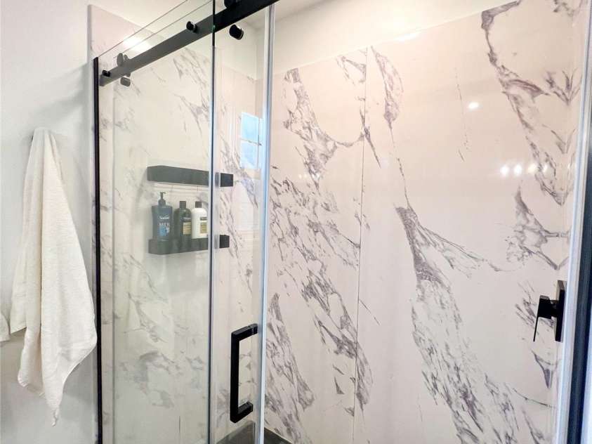 805 Reems Creek Road, Weaverville, NC 28787.  MLS# CAR4206802, YatesRealty ID 12835. Large walk-in shower.