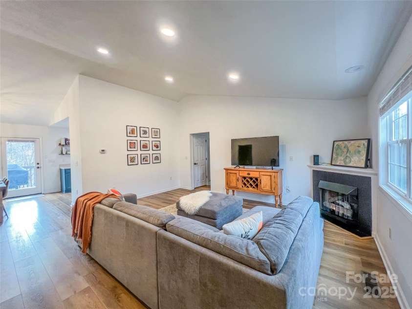 805 Reems Creek Road, Weaverville, NC 28787.  MLS# CAR4206802, YatesRealty ID 12835. Living room is large with lots of natural light, vaulted ceilings, and open floor plan.