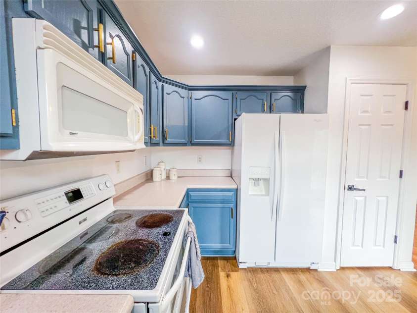 805 Reems Creek Road, Weaverville, NC 28787.  MLS# CAR4206802, YatesRealty ID 12835. Nice sized pantry located next to fridge.