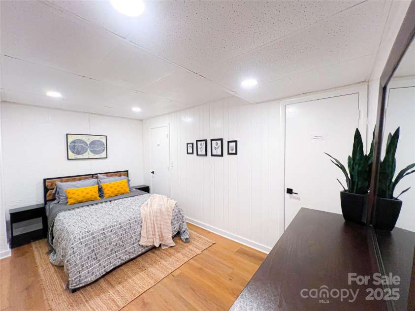 805 Reems Creek Road, Weaverville, NC 28787.  MLS# CAR4206802, YatesRealty ID 12835. This room is being used like a bedroom (non-conforming) and has two closets.