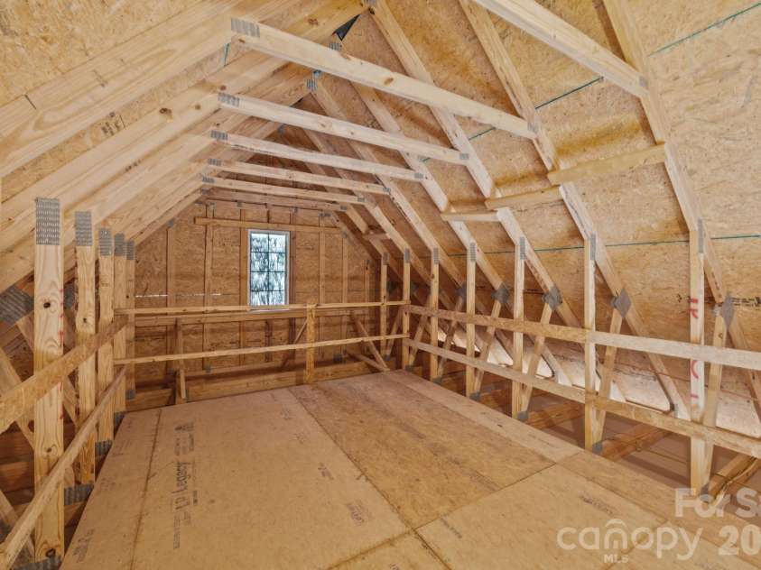 4840 Maiden Creek Way, Maiden, NC 28650.  MLS# CAR4367470, YatesRealty ID 12836. BONUS STORAGE ROOM accessed from pull down stairs in garage!  HUGE area to store all your extra's in life and keep the house clutter free. Love this!