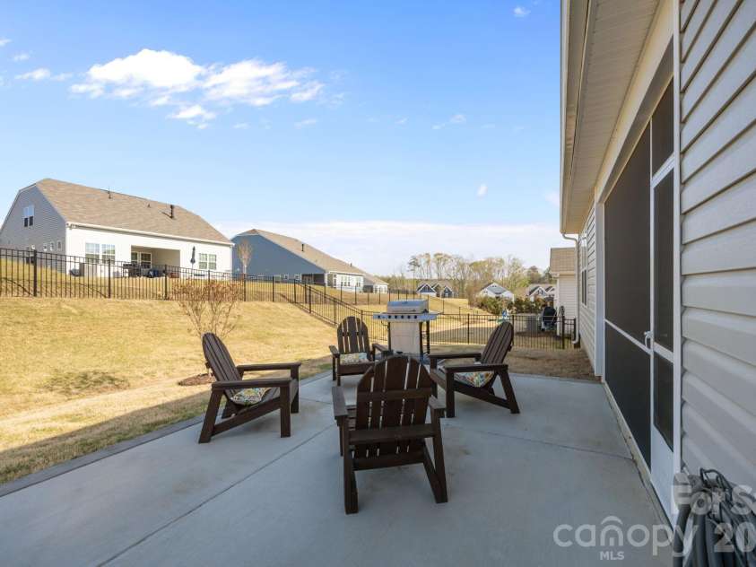 4840 Maiden Creek Way, Maiden, NC 28650.  MLS# CAR4367470, YatesRealty ID 12836. Enjoy this extra large extended patio and grill pad.  