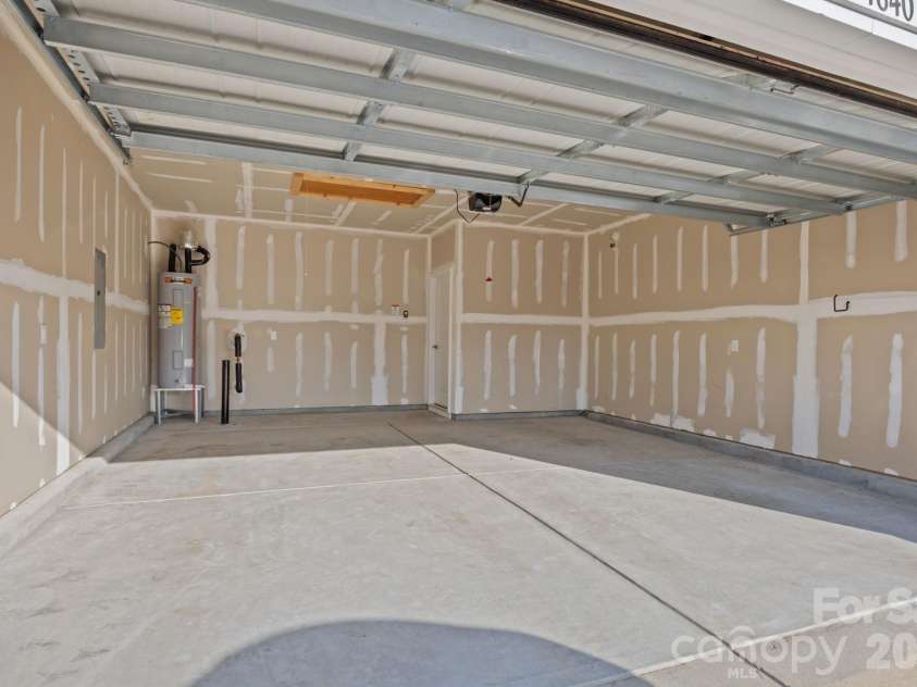 4840 Maiden Creek Way, Maiden, NC 28650.  MLS# CAR4367470, YatesRealty ID 12836. Extra large garage, insulated and drywalled!  PLUS BONUS storage room with pull down stairs!