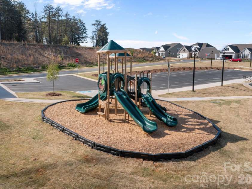 4840 Maiden Creek Way, Maiden, NC 28650.  MLS# CAR4367470, YatesRealty ID 12836. Playground sits side by side with Pool and Community Center