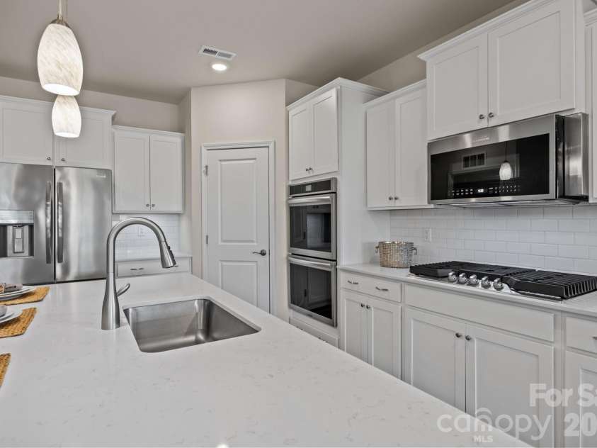 4840 Maiden Creek Way, Maiden, NC 28650.  MLS# CAR4367470, YatesRealty ID 12836. Upgraded Frigidaire Gallery appliances include the double wall oven and fully programmable state-of-the-art microwave, diswasher and built-in gas range.