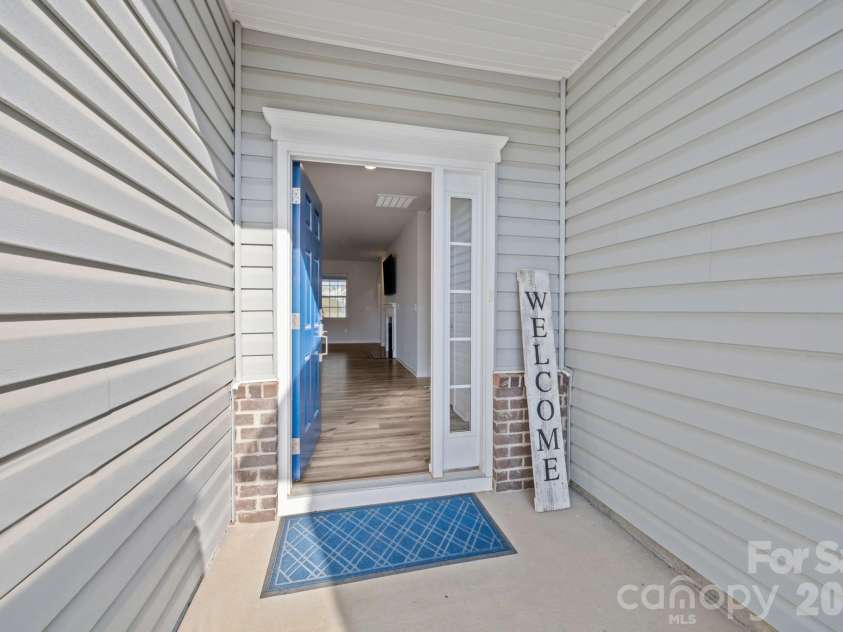 4840 Maiden Creek Way, Maiden, NC 28650.  MLS# CAR4367470, YatesRealty ID 12836. Welcoming covered entry!