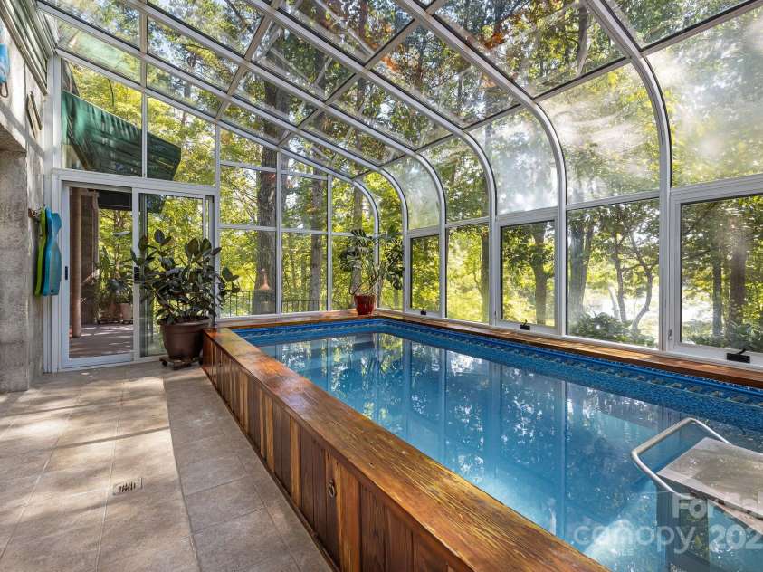 91 Island View Court, Mill Spring, NC 28756.  MLS# CAR4183479, YatesRealty ID 12838. Heated indoor Endless Pool