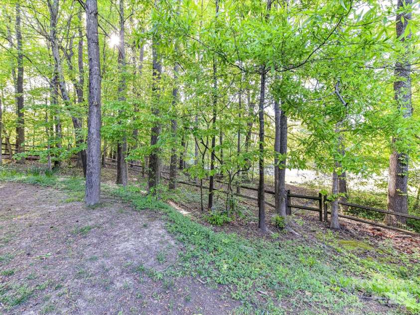 5043 Hickory Lake Lane, Matthews, NC 28105.  MLS# CAR4243807, YatesRealty ID 12839. 