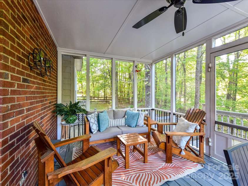 5043 Hickory Lake Lane, Matthews, NC 28105.  MLS# CAR4243807, YatesRealty ID 12839. Back covered porch