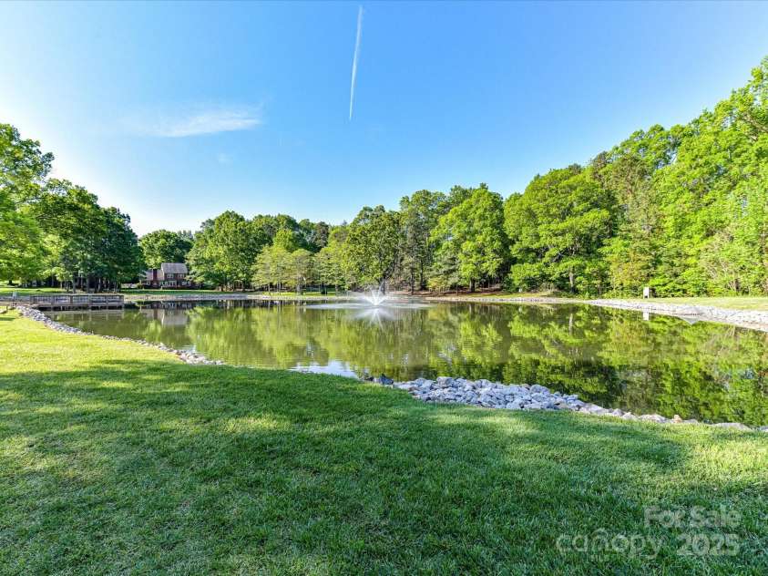 5043 Hickory Lake Lane, Matthews, NC 28105.  MLS# CAR4243807, YatesRealty ID 12839. Community Pond