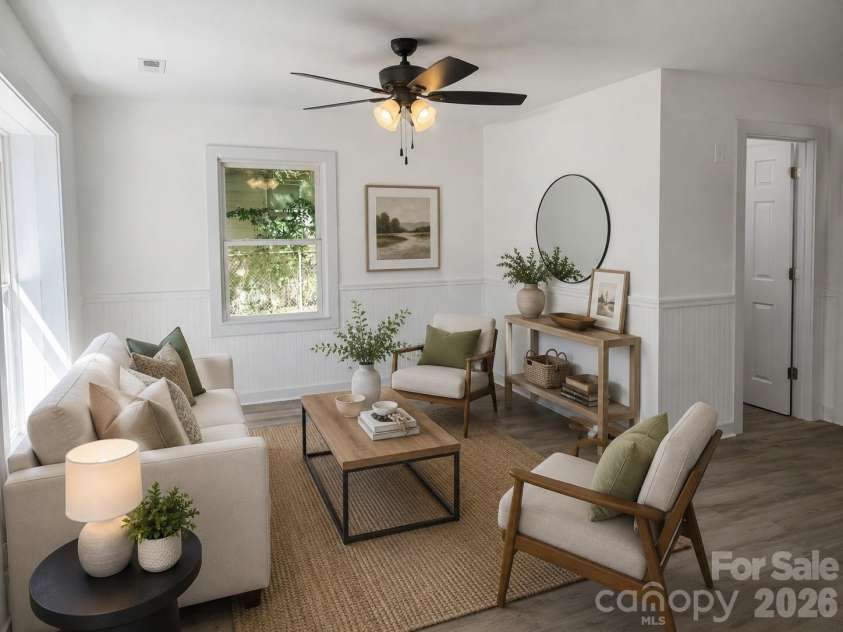 1123 Saratoga Drive, Charlotte, NC 28208.  MLS# CAR4315319, YatesRealty ID 1284. Virtually Staged living room 