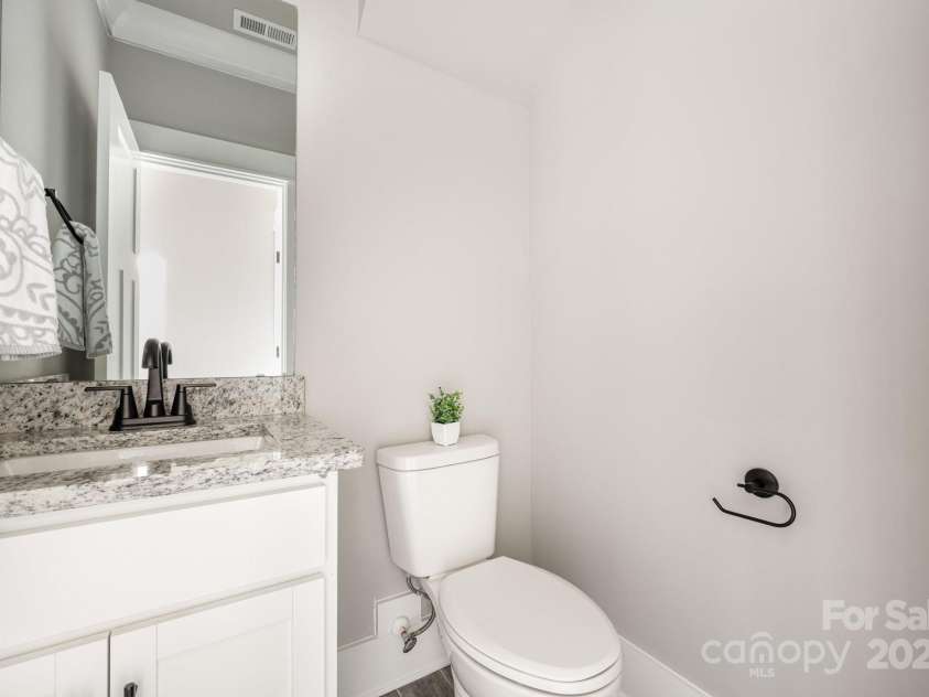 4139 Twenty Grand Drive, Indian Trail, NC 28079.  MLS# CAR4319478, YatesRealty ID 12841. Half bathroom on main floor