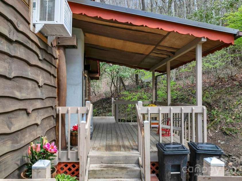 159 Willow Lane, Rosman, NC 28772.  MLS# CAR4247318, YatesRealty ID 12843. Covered Side Porch