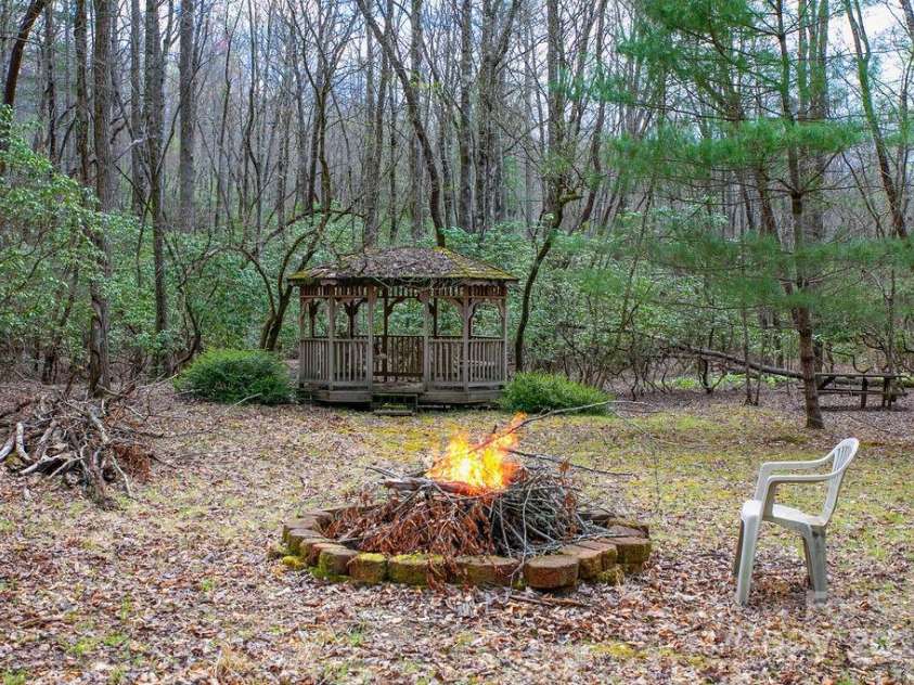 159 Willow Lane, Rosman, NC 28772.  MLS# CAR4247318, YatesRealty ID 12843. Fire Pit