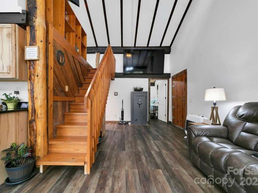 159 Willow Lane, Rosman, NC 28772.  MLS# CAR4247318, YatesRealty ID 12843. Stairs to Loft