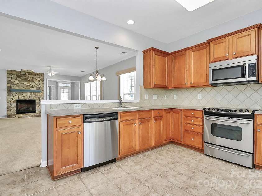 18020 Owl Court, Indian Land, SC 29707.  MLS# CAR4251346, YatesRealty ID 12851. Solid Surface Counter Tops