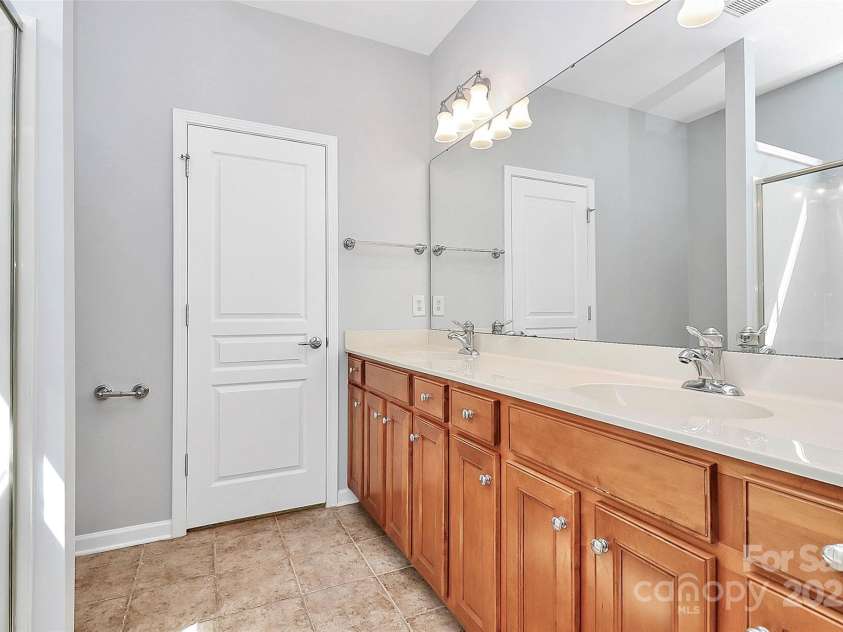 18020 Owl Court, Indian Land, SC 29707.  MLS# CAR4251346, YatesRealty ID 12851. Tons for Cabinets with 2 lavatories