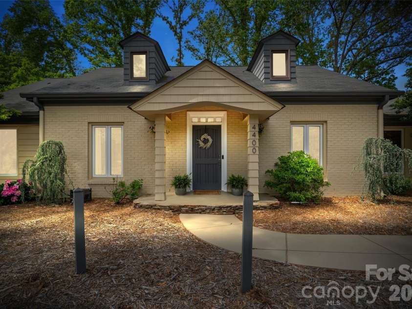 4400 Woods End Lane, Charlotte, NC 28277.  MLS# CAR4366467, YatesRealty ID 12852. Front Exterior Twilight