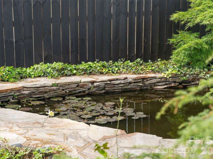 4400 Woods End Lane, Charlotte, NC 28277.  MLS# CAR4366467, YatesRealty ID 12852. Koi Fishpond