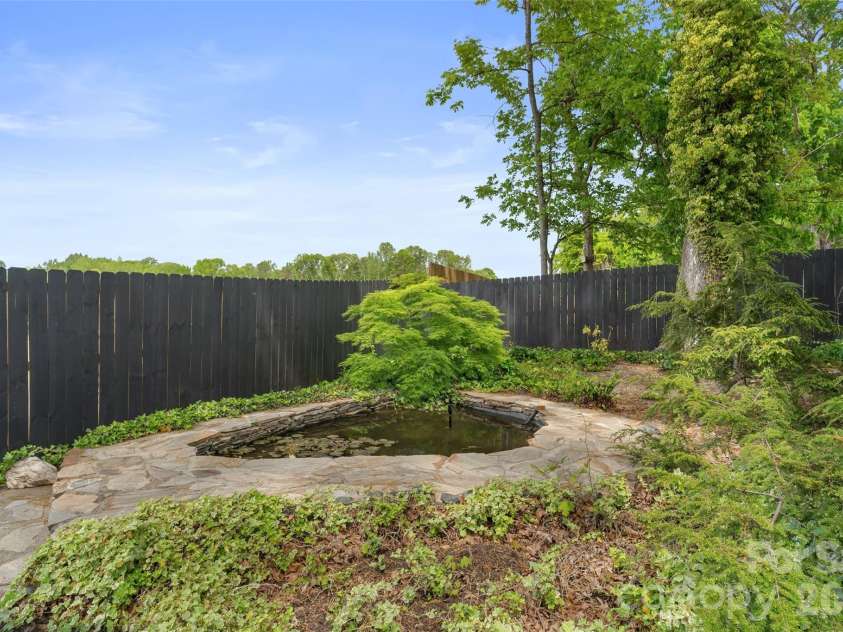 4400 Woods End Lane, Charlotte, NC 28277.  MLS# CAR4366467, YatesRealty ID 12852. Koi Fishpond