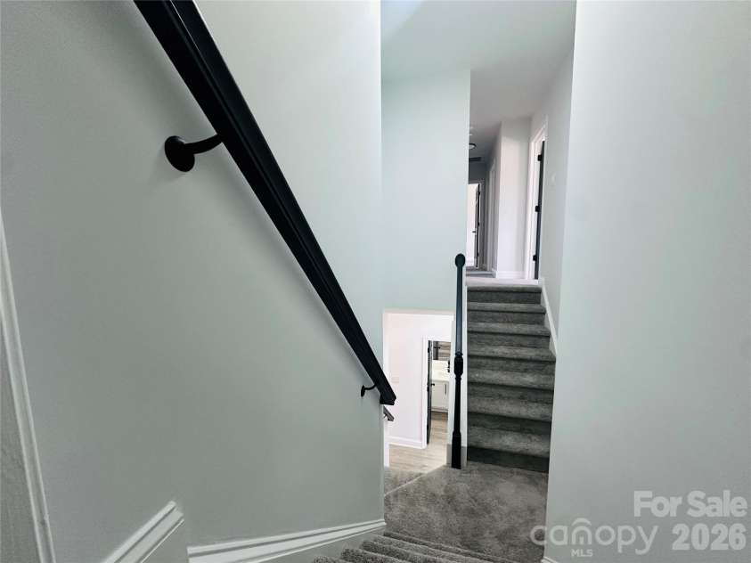 3804 Lincoln Court, Indian Trail, NC 28079.  MLS# CAR4359519, YatesRealty ID 12856. Beautiful staircase that gently opens into two paths.