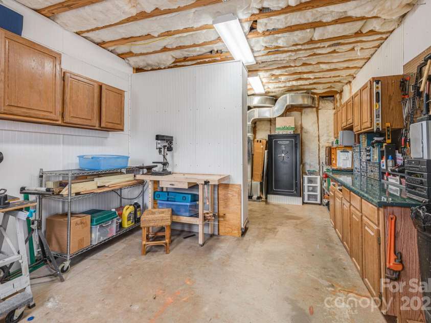 169 Stoneybrook Way, Tryon, NC 28782.  MLS# CAR4217213, YatesRealty ID 1286. 343 sq. ft. workshop area. Unheated.