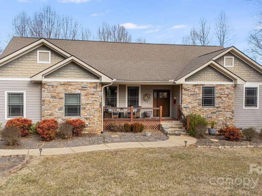 169 Stoneybrook Way, Tryon, NC 28782.  MLS# CAR4217213, YatesRealty ID 1286. A well maintained home. Open and airy landscape.