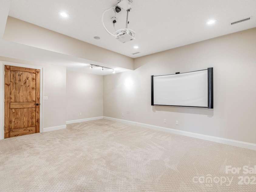 169 Stoneybrook Way, Tryon, NC 28782.  MLS# CAR4217213, YatesRealty ID 1286. Home media room with large closet.