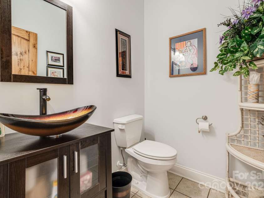 169 Stoneybrook Way, Tryon, NC 28782.  MLS# CAR4217213, YatesRealty ID 1286. Powder room adjacent to the laundry room.
