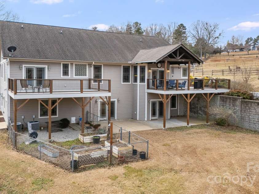 169 Stoneybrook Way, Tryon, NC 28782.  MLS# CAR4217213, YatesRealty ID 1286. Raised garden bed to grow your own produce or flowers.