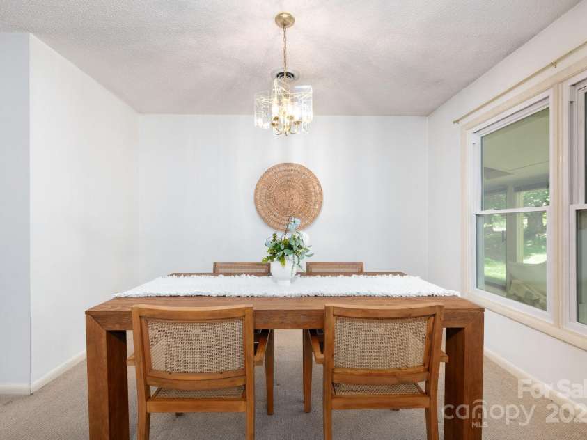 36 Elderberry Lane, Asheville, NC 28805.  MLS# CAR4240717, YatesRealty ID 12860. Dining room off kitchen and living room