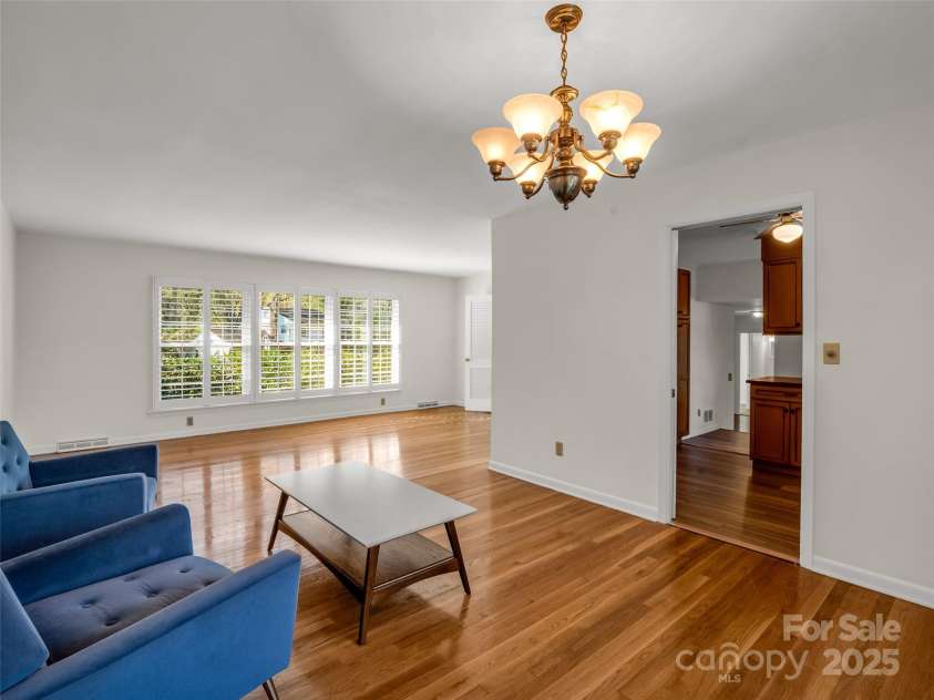 101 Bent Creek Ranch Road, Asheville, NC 28806.  MLS# CAR4318923, YatesRealty ID 12867. Dining Room opens to Living Room