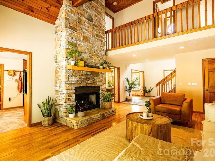 226 Wildcat Mountain Trail, Sylva, NC 28779.  MLS# CAR4284312, YatesRealty ID 12873. Great room with cathedral ceilings