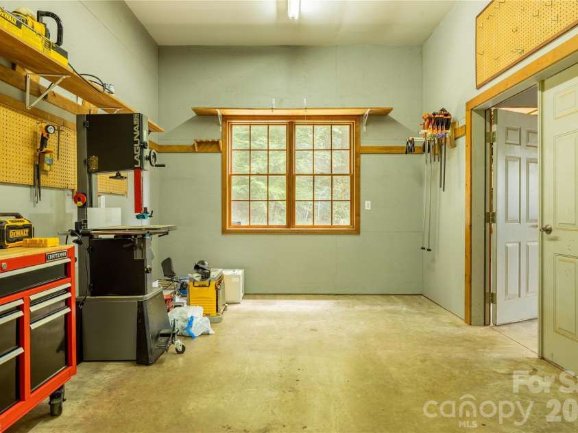 226 Wildcat Mountain Trail, Sylva, NC 28779.  MLS# CAR4284312, YatesRealty ID 12873. More workshop space with plenty of space for your equipment
