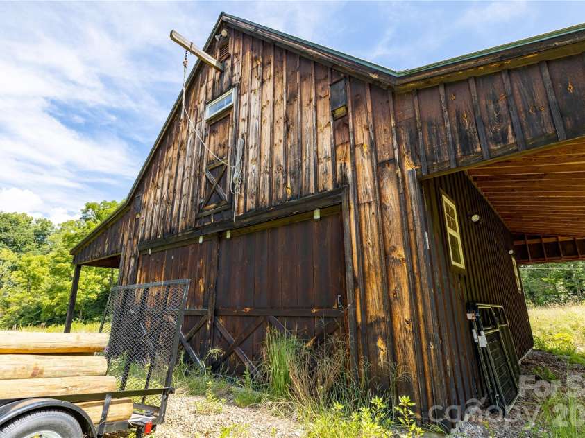 226 Wildcat Mountain Trail, Sylva, NC 28779.  MLS# CAR4284312, YatesRealty ID 12873. Spacious barn with two levels and abundant storage.