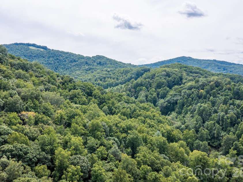 226 Wildcat Mountain Trail, Sylva, NC 28779.  MLS# CAR4284312, YatesRealty ID 12873. Surrounding mountains