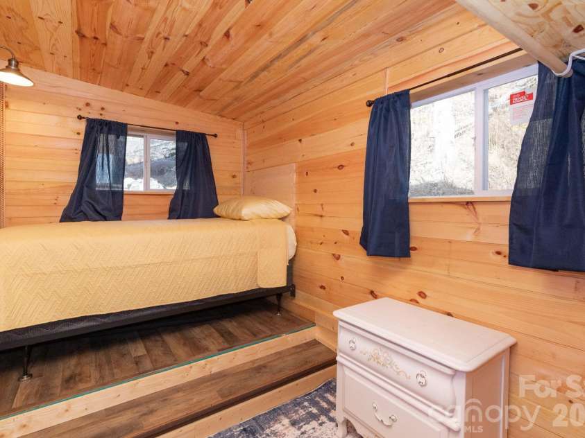 1010 and 1014 Melton Branch Road, Bakersville, NC 28705.  MLS# CAR4334266, YatesRealty ID 12881. Main Level 3rd sleeping room