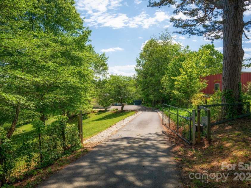 1572 Alexander Road, Leicester, NC 28748.  MLS# CAR4252081, YatesRealty ID 12882. Electric Gate at Private Entrance
