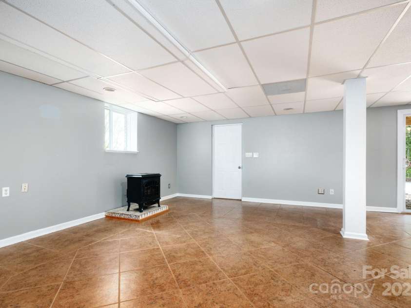 1572 Alexander Road, Leicester, NC 28748.  MLS# CAR4252081, YatesRealty ID 12882. Gas Fireplace