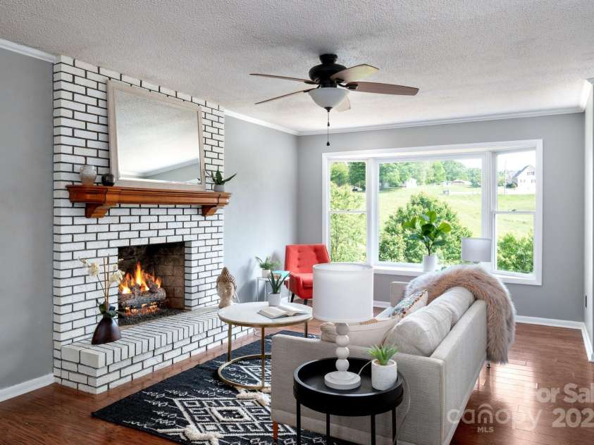 1572 Alexander Road, Leicester, NC 28748.  MLS# CAR4252081, YatesRealty ID 12882. Gas Logs Fireplace