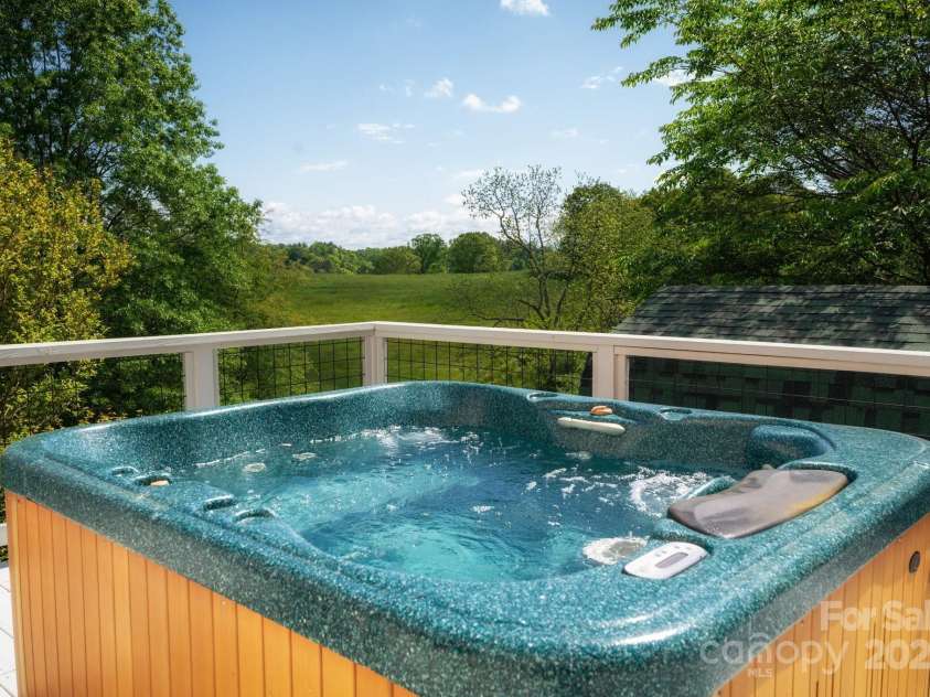 1572 Alexander Road, Leicester, NC 28748.  MLS# CAR4252081, YatesRealty ID 12882. Hot Tub on Main Deck with Expansive Sky Views