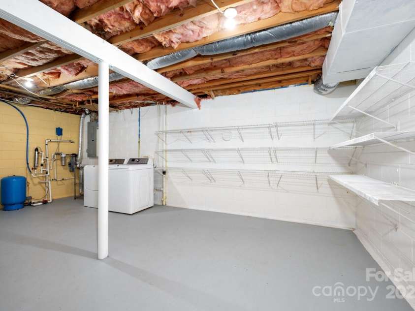 1572 Alexander Road, Leicester, NC 28748.  MLS# CAR4252081, YatesRealty ID 12882. Laundry Room and Storage